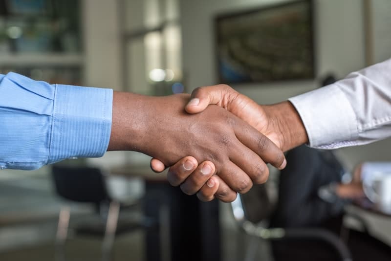 Successful handshake closing the deal